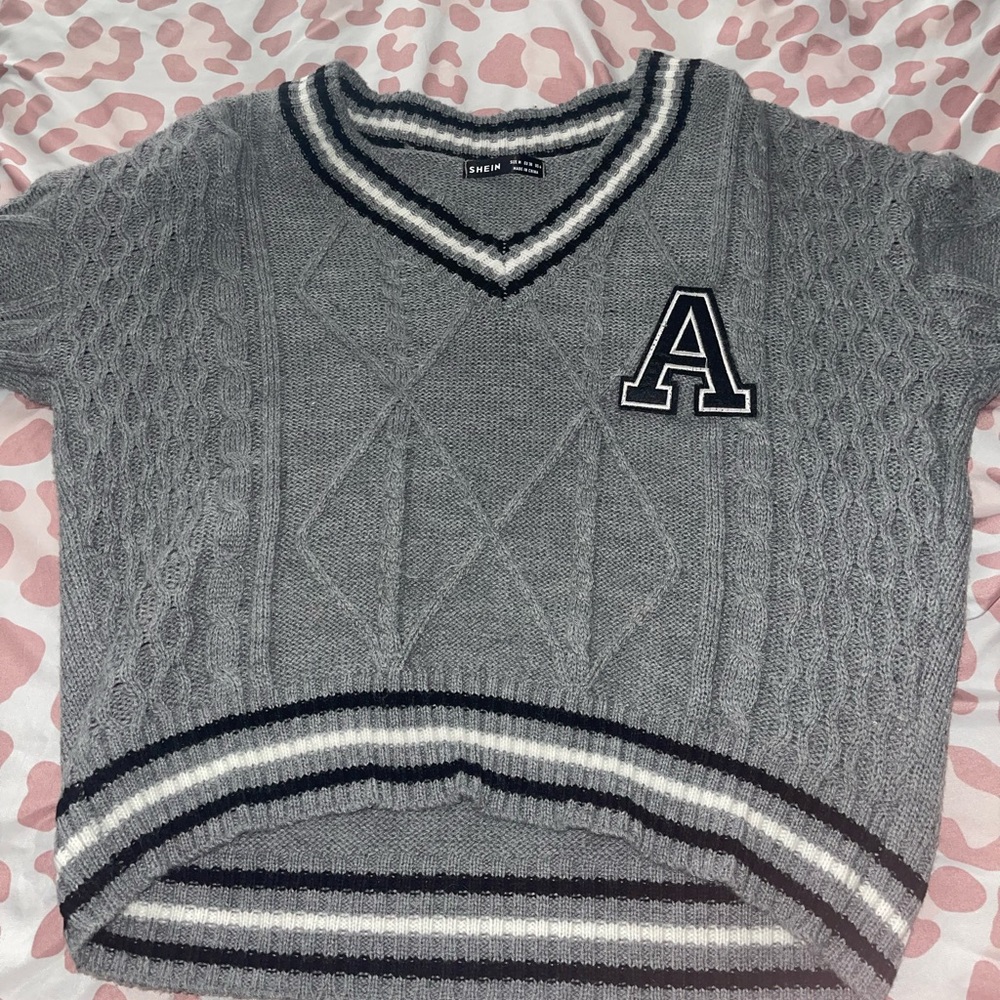 A sweater and a leather skirt !! Only wore one size for both : medium